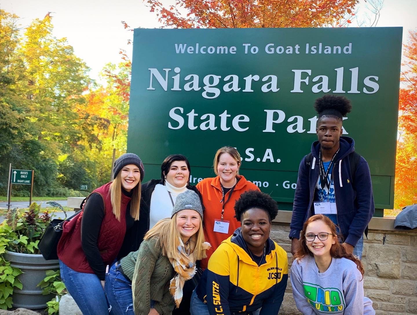students posing in front of Niagara Falls sign
